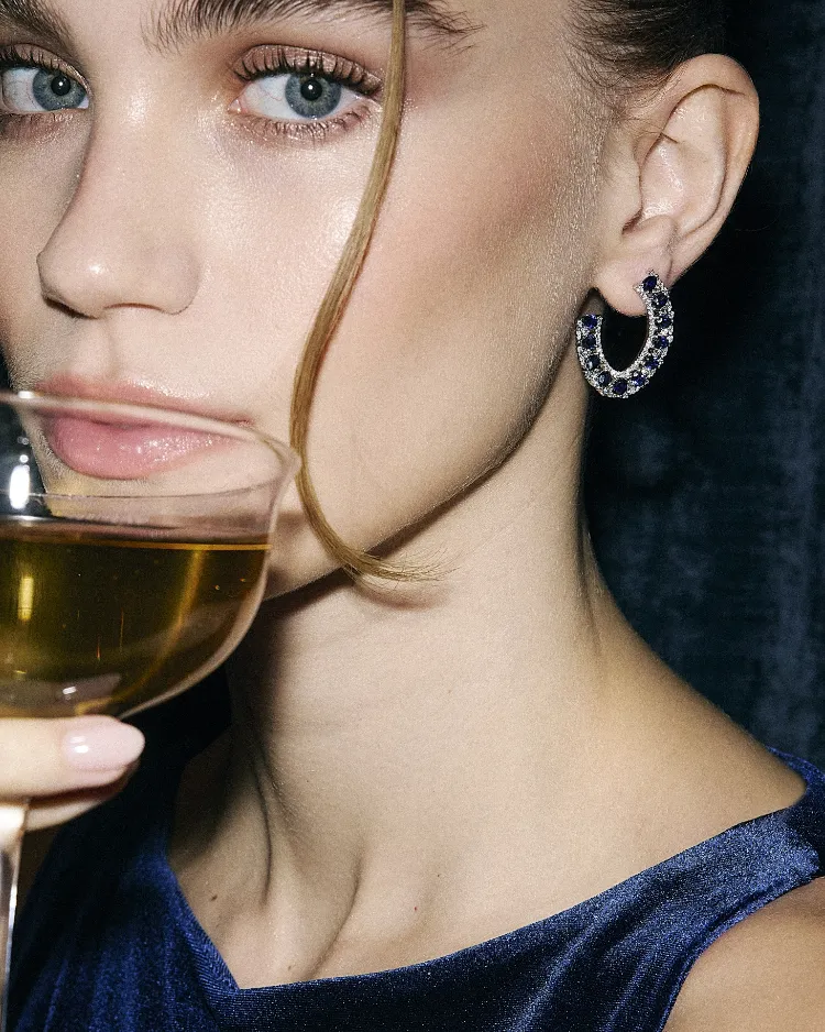 woman sipping a drink