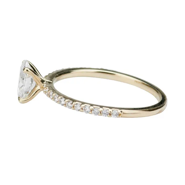 0.97 CTW Oval Side-Stone Engagement Ring